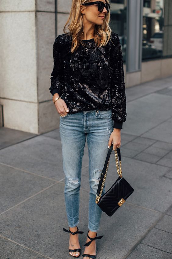 Lady with Sequin Top and Jeans